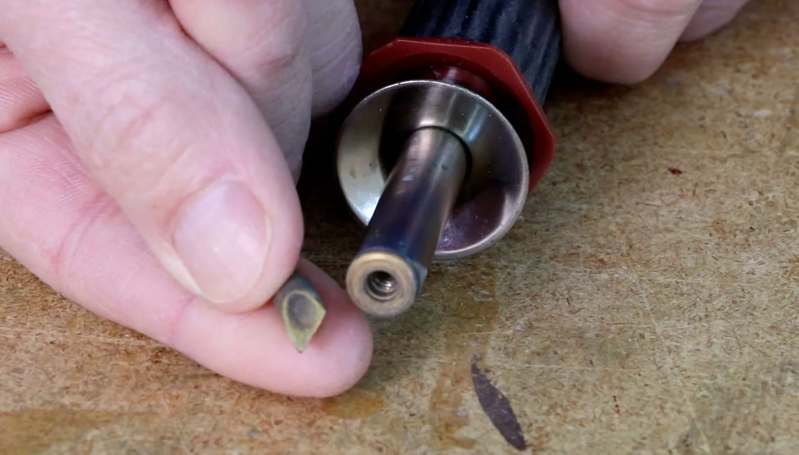 Fitting a brass tip into a woodburning pen